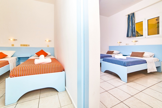 Imagen de la habitación del Hotel Village Oasis. Foto 6