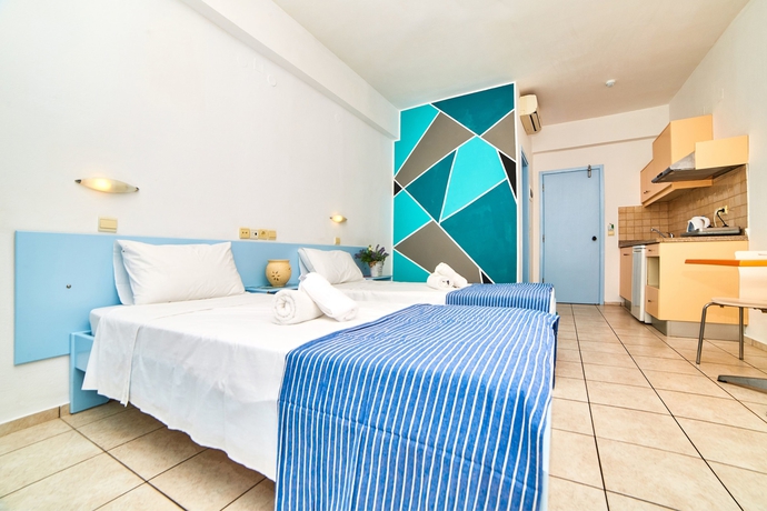 Imagen de la habitación del Hotel Village Oasis. Foto 7