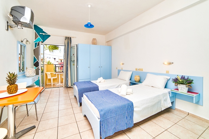 Imagen de la habitación del Hotel Village Oasis. Foto 9