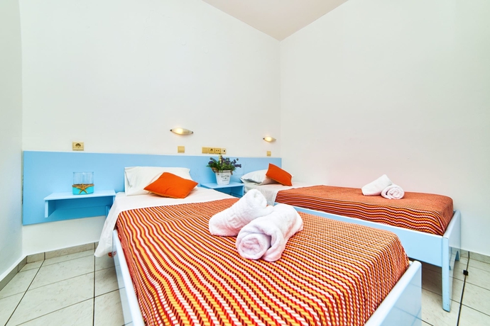 Imagen de la habitación del Hotel Village Oasis. Foto 10