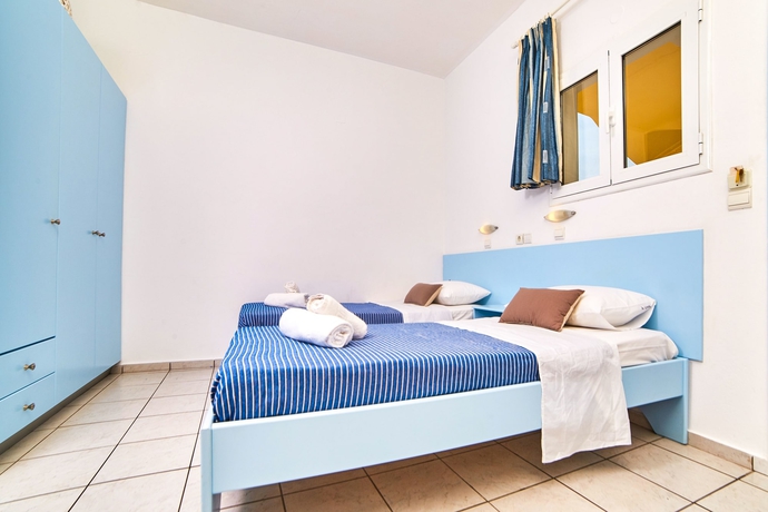 Imagen de la habitación del Hotel Village Oasis. Foto 12