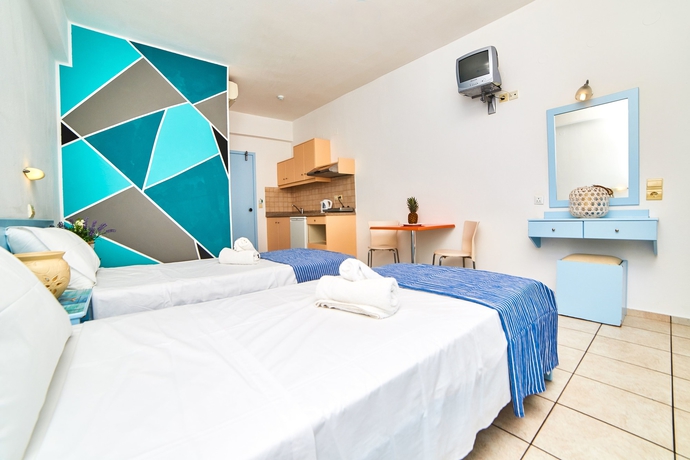 Imagen de la habitación del Hotel Village Oasis. Foto 13