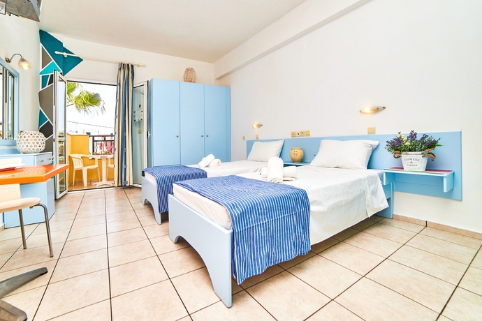 Imagen de la habitación del Hotel Village Oasis. Foto 14