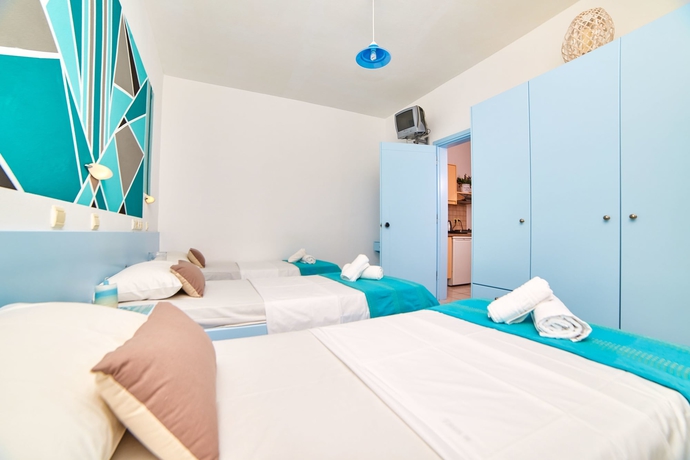 Imagen de la habitación del Hotel Village Oasis. Foto 16