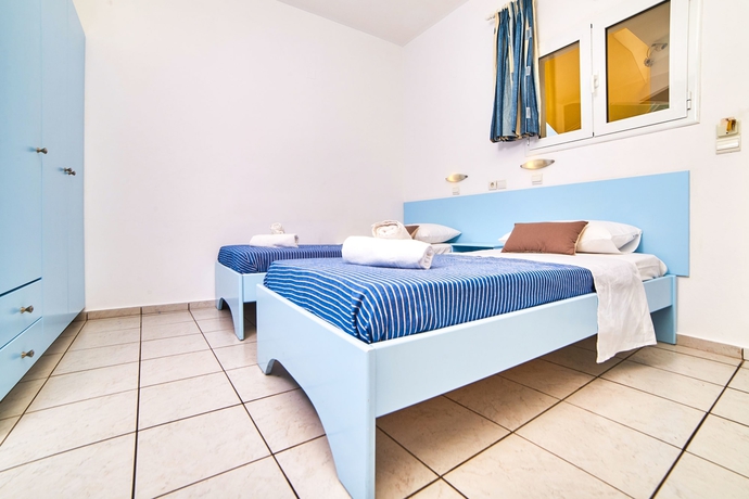 Imagen de la habitación del Hotel Village Oasis. Foto 17