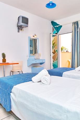Imagen de la habitación del Hotel Village Oasis. Foto 18