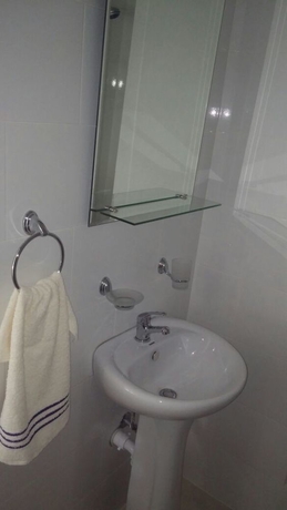 Imagen de la habitación del Hotel Village On The Beach. Foto 3