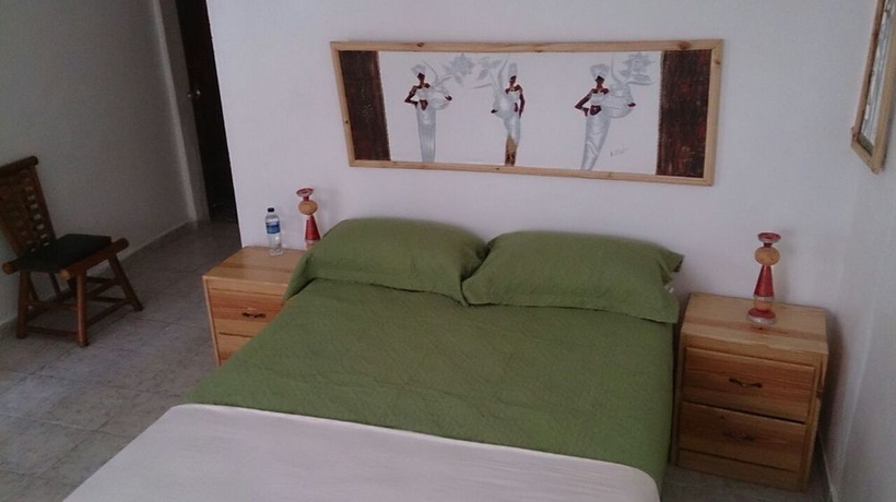 Imagen de la habitación del Hotel Village On The Beach. Foto 6