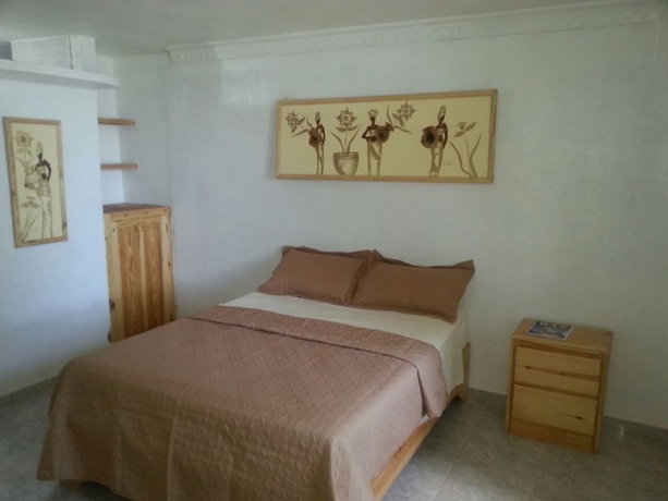 Imagen de la habitación del Hotel Village On The Beach. Foto 7