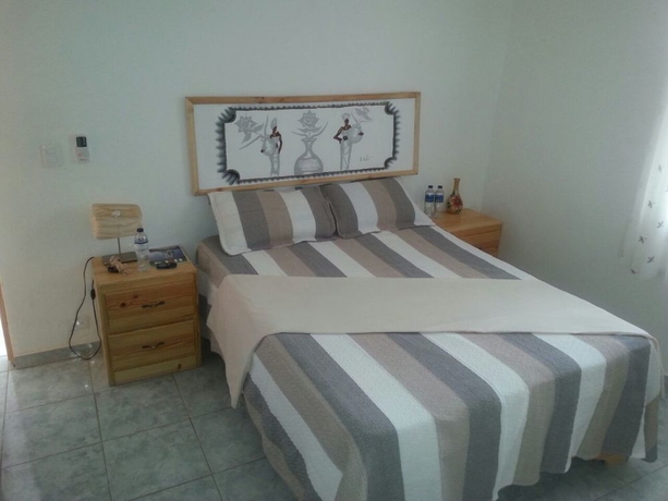 Imagen de la habitación del Hotel Village On The Beach. Foto 8