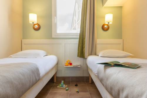 Imagen de la habitación del Hotel Village Pierre & Vacances - Normandy Garden. Foto 10