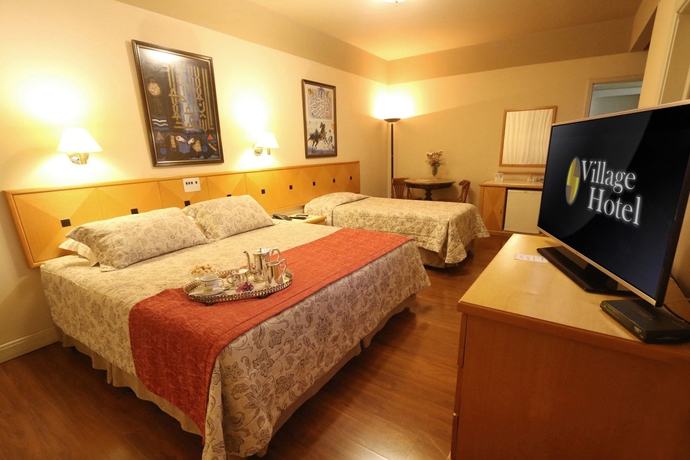 Imagen de la habitación del Hotel Village, Ponta Grossa. Foto 6