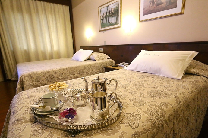 Imagen de la habitación del Hotel Village, Ponta Grossa. Foto 8