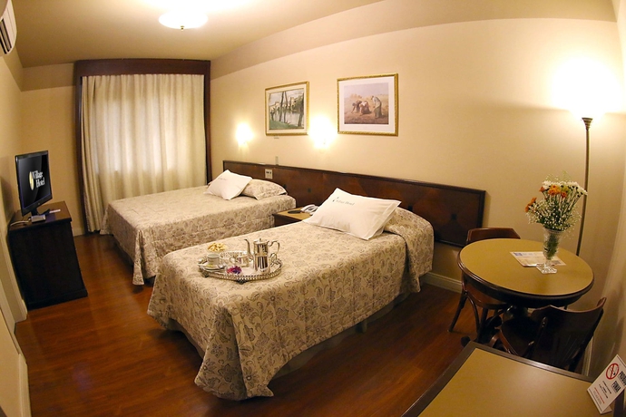 Imagen de la habitación del Hotel Village, Ponta Grossa. Foto 11