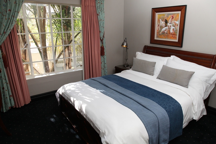 Imagen de la habitación del Hotel Village Ridge Boutique. Foto 12