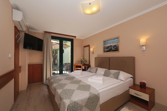 Imagen de la habitación del Hotel Village San Antonio. Foto 9