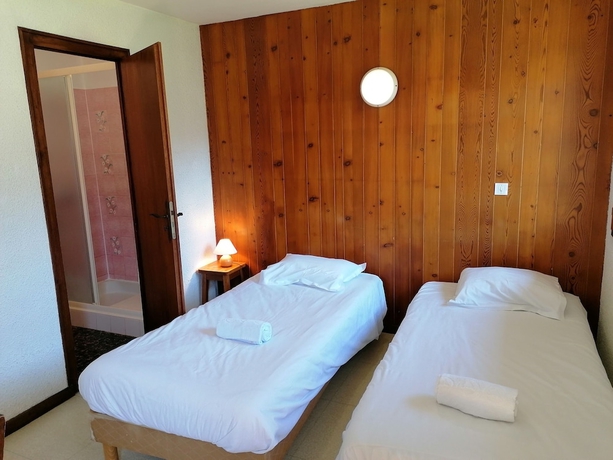 Imagen de la habitación del Hotel Village Vacances Le Savoy. Foto 6