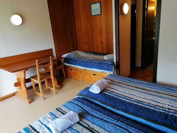 Imagen de la habitación del Hotel Village Vacances Le Savoy. Foto 7