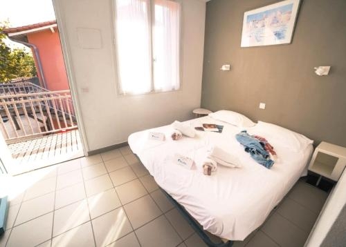 Imagen de la habitación del Hotel Village Vacances Lou Riou. Foto 7