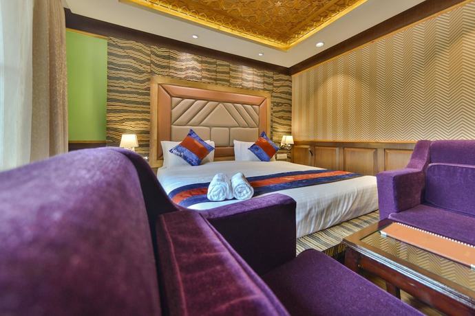 Imagen de la habitación del Hotel Village Walk. Foto 18