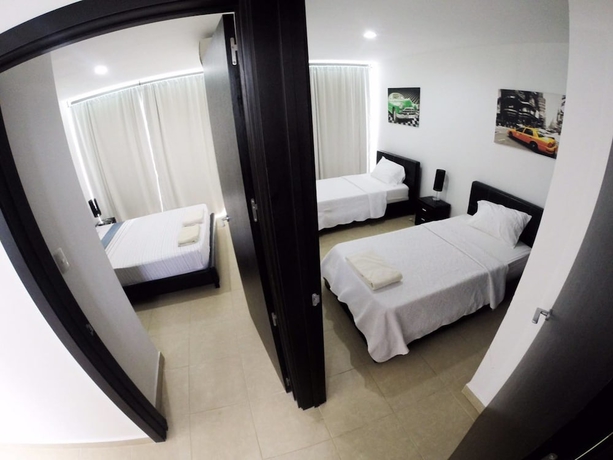 Imagen de la habitación del Hotel Village at the Pool. Foto 5