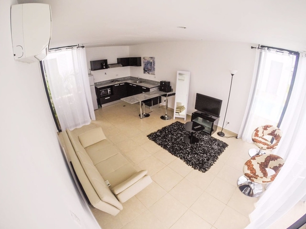 Imagen de la habitación del Hotel Village at the Pool. Foto 10