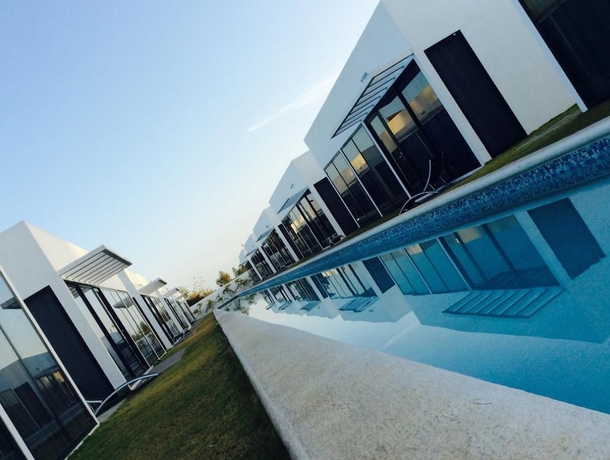 Imagen de la habitación del Hotel Village at the Pool. Foto 11