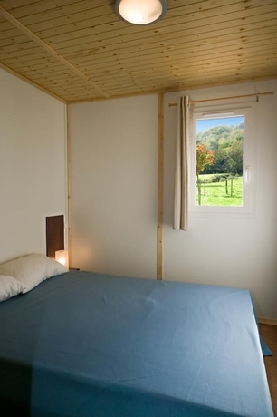 Imagen de la habitación del Hotel Village de Gite - La Cascade. Foto 19