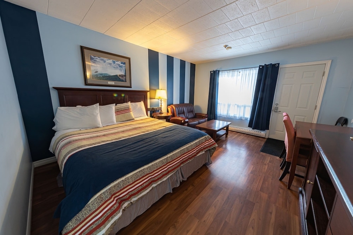 Imagen de la habitación del Hotel Villager Lodge. Foto 4