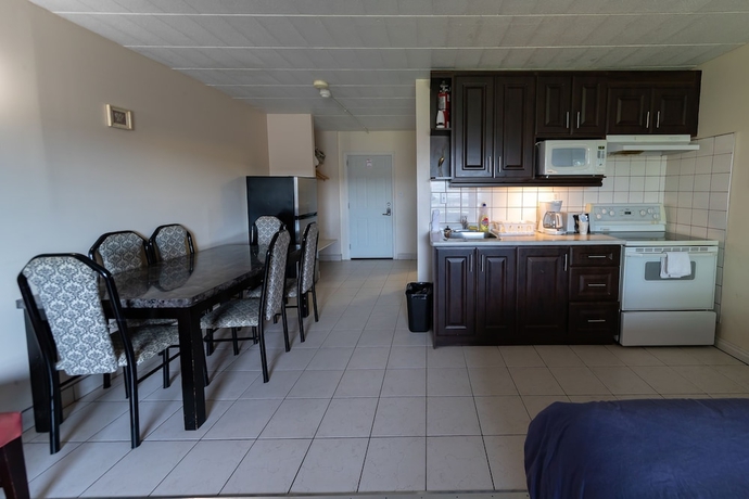 Imagen de la habitación del Hotel Villager Lodge. Foto 7