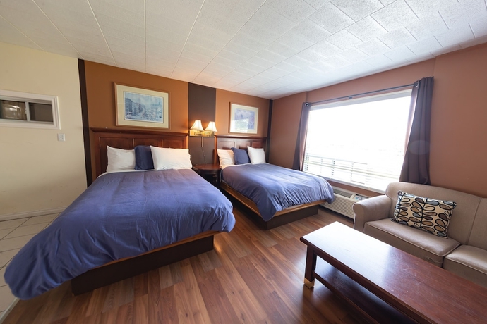 Imagen de la habitación del Hotel Villager Lodge. Foto 8