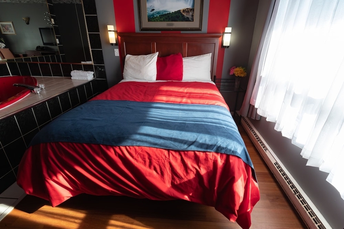 Imagen de la habitación del Hotel Villager Lodge. Foto 10