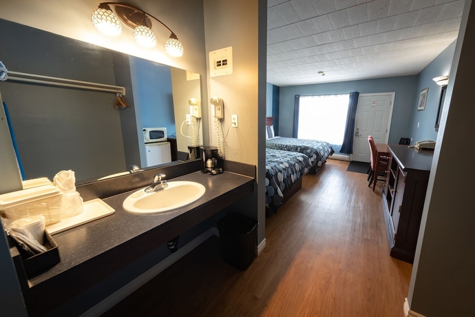 Imagen de la habitación del Hotel Villager Lodge. Foto 12