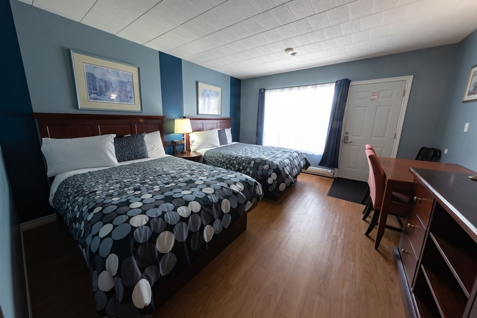 Imagen de la habitación del Hotel Villager Lodge. Foto 13