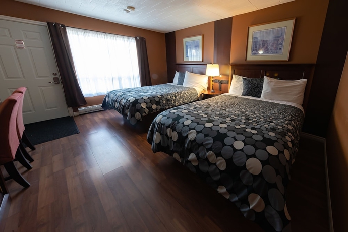 Imagen de la habitación del Hotel Villager Lodge. Foto 14