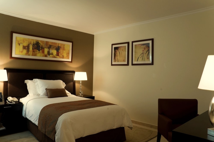 Imagen de la habitación del Hotel Villaggio Abu Dhabi. Foto 6