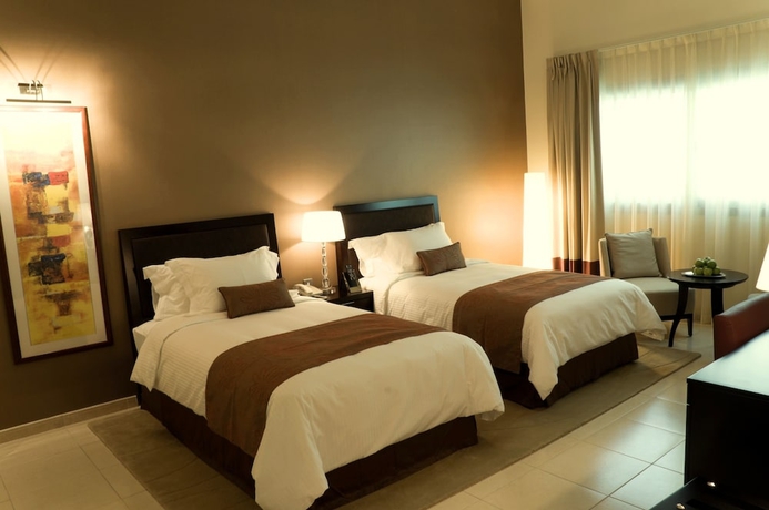 Imagen de la habitación del Hotel Villaggio Abu Dhabi. Foto 7