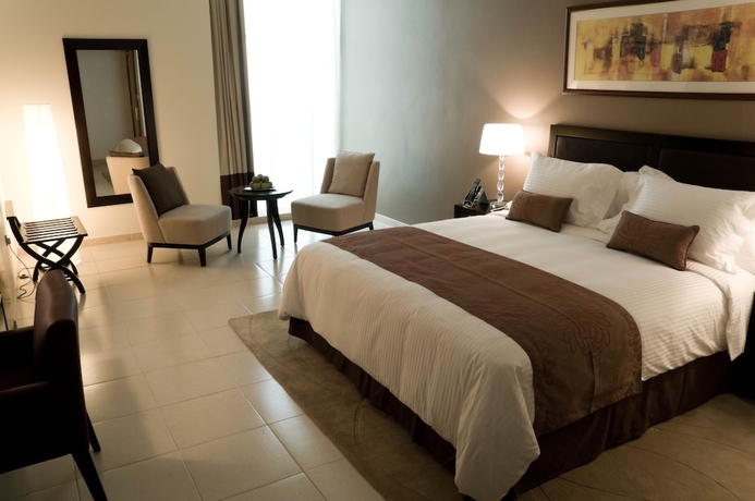 Imagen de la habitación del Hotel Villaggio Abu Dhabi. Foto 8