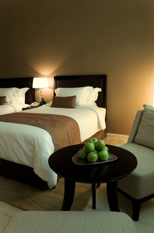 Imagen de la habitación del Hotel Villaggio Abu Dhabi. Foto 11