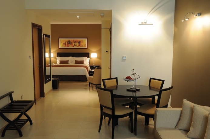 Imagen de la habitación del Hotel Villaggio Abu Dhabi. Foto 17