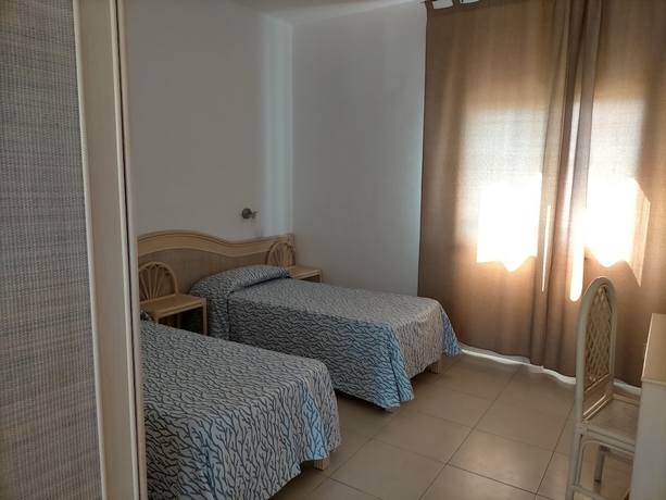 Imagen de la habitación del Hotel Villaggio Agrumeto. Foto 9