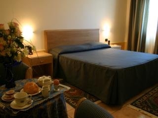 Imagen de la habitación del Hotel Villaggio Albergo Belmonte. Foto 7