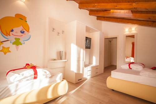 Imagen de la habitación del Hotel Villaggio Albergo Nevada. Foto 9