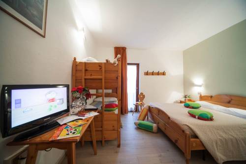 Imagen de la habitación del Hotel Villaggio Albergo Nevada. Foto 11