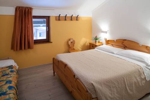 Imagen de la habitación del Hotel Villaggio Albergo Nevada. Foto 12