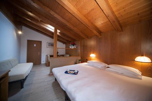 Imagen de la habitación del Hotel Villaggio Albergo Nevada. Foto 15