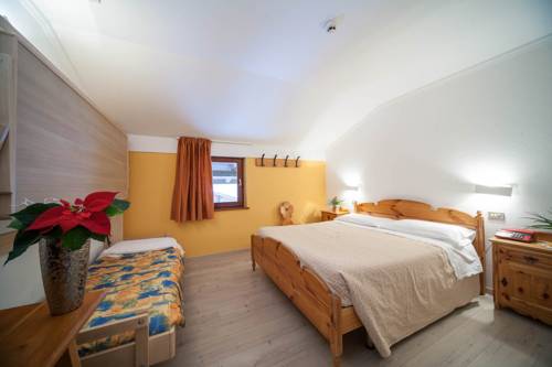 Imagen de la habitación del Hotel Villaggio Albergo Nevada. Foto 16