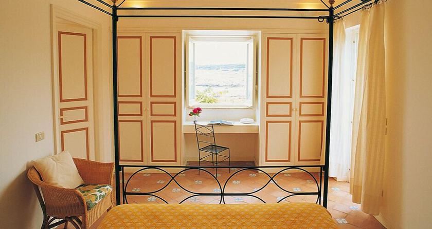 Imagen de la habitación del Hotel Villaggio Approdo Di Ulisse. Foto 6