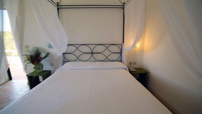 Imagen de la habitación del Hotel Villaggio Approdo Di Ulisse. Foto 10