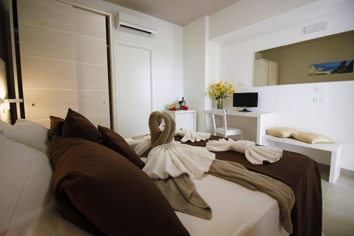 Imagen de la habitación del Hotel Villaggio Baia D'ercole. Foto 2